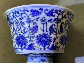 A Chinese inscribed blue and white stem cup, Qianlong seal mark and of the period